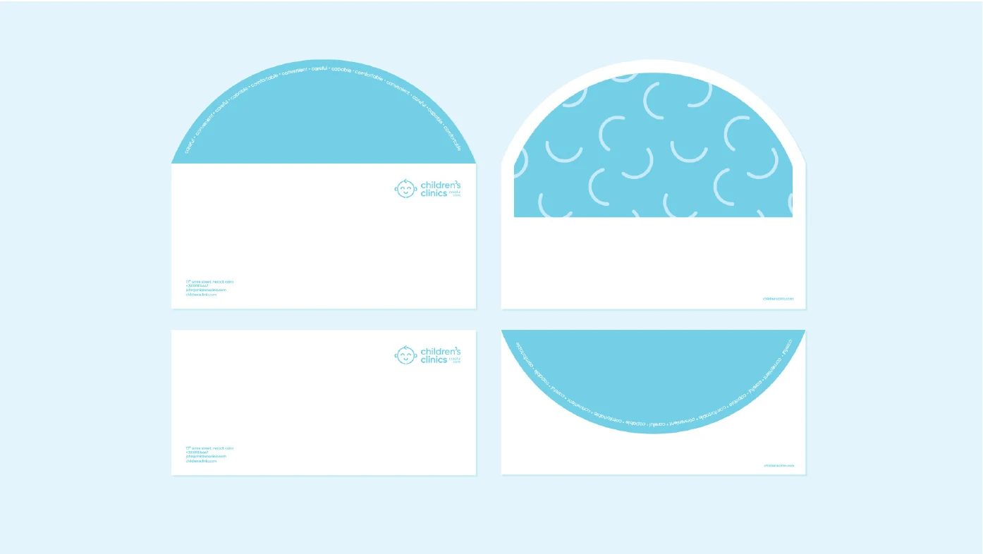 Children’s Clinics stationery set on a pale blue background