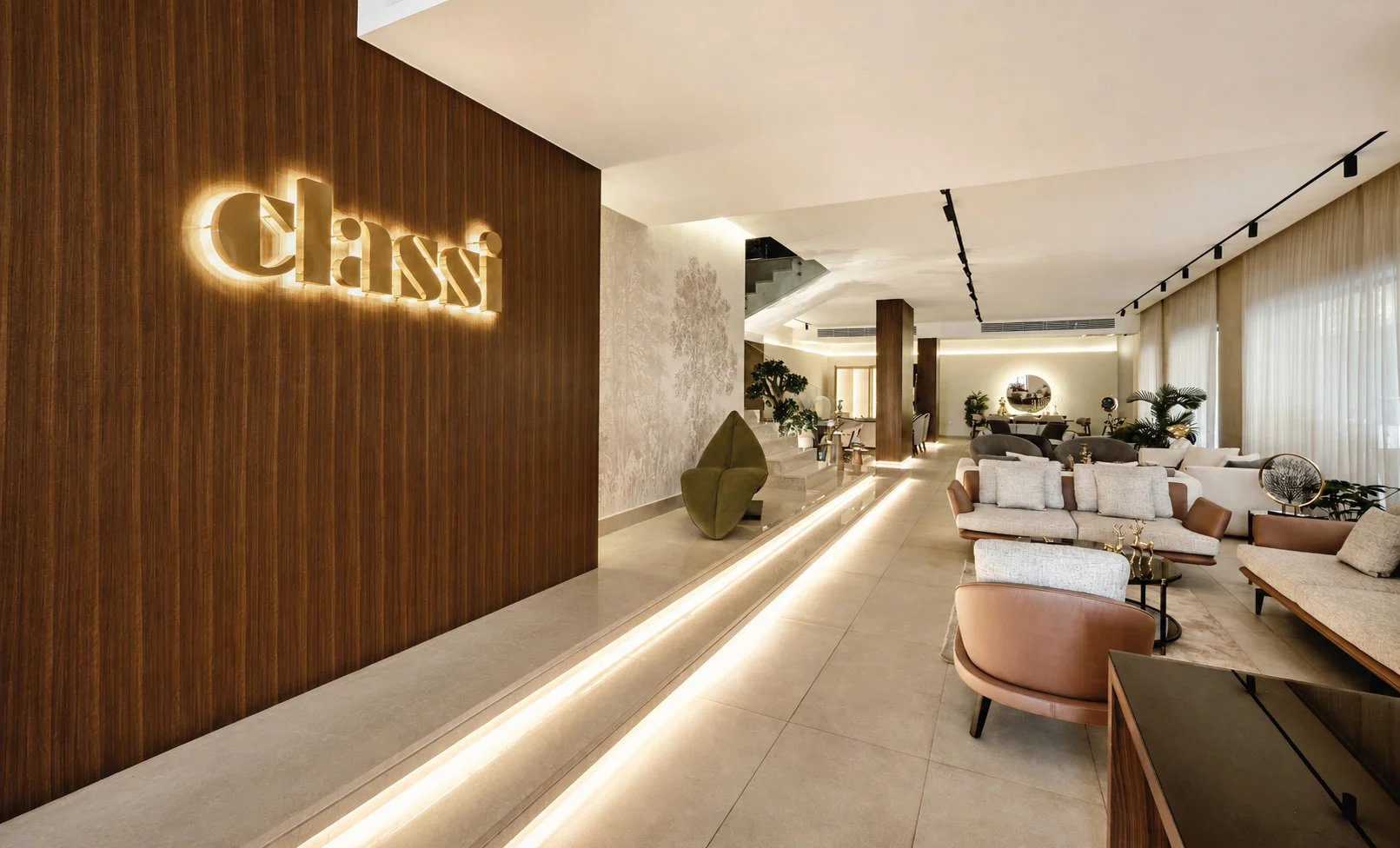 Walnut wall with glowing Classi lettering along the showroom axis